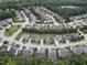 An aerial view displays the neighborhood layout, showcasing the arrangement of homes, streets, and green spaces at 212 Preatonwood Dr, Apex, NC 27539