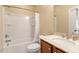 Bathroom features tub and shower, marble-top vanity, toilet, and modern fixtures at 212 Preatonwood Dr, Apex, NC 27539