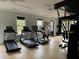 Well-equipped gym featuring treadmills and other exercise machines, offering a convenient fitness option at 212 Preatonwood Dr, Apex, NC 27539