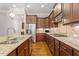 Sleek kitchen featuring stainless steel appliances, granite countertops, and ample storage space at 212 Preatonwood Dr, Apex, NC 27539