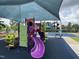 Colorful community playground with slides and climbing structures, perfect for recreation at 212 Preatonwood Dr, Apex, NC 27539