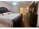 Close up of the main bedroom showing the bed, furniture and bathroom entrance at 2221 Delaney Dr # 112, Burlington, NC 27215