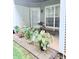 Charming patio adorned with potted plants, perfect for outdoor relaxation and gardening at 2221 Delaney Dr # 112, Burlington, NC 27215