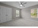 Cozy bedroom with bright, natural light and plush carpet at 238 Langford Valley Way, Cary, NC 27513