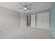 Spacious bedroom featuring plush carpeting and a ceiling fan at 238 Langford Valley Way, Cary, NC 27513