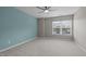 Bright bedroom with a large window and neutral carpet at 238 Langford Valley Way, Cary, NC 27513