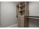 Walk-in closet with custom shelving and drawers, maximizing storage space at 238 Langford Valley Way, Cary, NC 27513