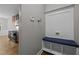Hallway features a convenient built-in bench and coat rack near the kitchen at 238 Langford Valley Way, Cary, NC 27513