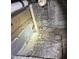 Unfinished basement with aged brick and plumbing fixtures for a unique renovation project at 2507 Chapel Hill Rd, Durham, NC 27707