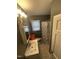 Small bathroom with standard-sized tub, single sink vanity, and tile floor at 2507 Chapel Hill Rd, Durham, NC 27707