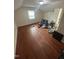 Bedroom featuring hardwood floors and natural light at 2507 Chapel Hill Rd, Durham, NC 27707