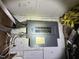 Basement electrical box with multiple circuit breakers, offering potential for upgrading electric service at 2507 Chapel Hill Rd, Durham, NC 27707