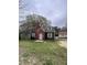 Charming two-story home featuring a brick chimney, dormer window and classic green window shutters at 2507 Chapel Hill Rd, Durham, NC 27707
