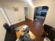 Living room featuring hardwood floors and a doorway into the kitchen at 2507 Chapel Hill Rd, Durham, NC 27707