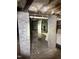 Spacious basement featuring support beams, concrete pillars and exposed ceiling with insulation at 2509 Chapel Hill Rd, Durham, NC 27707