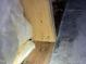 Close up of wooden beam and insulation at 2509 Chapel Hill Rd, Durham, NC 27707