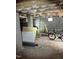 Unfinished basement showing concrete walls and wooden beams at 2509 Chapel Hill Rd, Durham, NC 27707