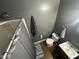 Compact bathroom with shower, toilet, and vanity with sink at 2509 Chapel Hill Rd, Durham, NC 27707
