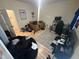 Bedroom with hardwood flooring, window, bed, and area for a desk at 2509 Chapel Hill Rd, Durham, NC 27707