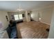 Bright living room with hardwood floors, featuring an open layout perfect for entertaining guests at 2509 Chapel Hill Rd, Durham, NC 27707