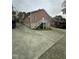 Exterior perspective showcasing the architectural design with a focus on the back entrance at 2509 Chapel Hill Rd, Durham, NC 27707
