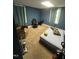 Bedroom featuring blue walls, carpet and natural light at 2511 Chapel Hill Rd, Durham, NC 27707