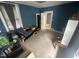 Bedroom with neutral carpet, blue walls, natural light and closet at 2511 Chapel Hill Rd, Durham, NC 27707