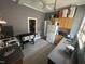 Functional kitchen with stainless steel appliances, wooden cabinets, and a view through a doorway at 2511 Chapel Hill Rd, Durham, NC 27707