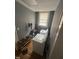 Laundry room featuring a window for natural light, and a washer and dryer at 2511 Chapel Hill Rd, Durham, NC 27707