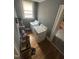 Functional laundry room with a washer and dryer, storage and natural light at 2511 Chapel Hill Rd, Durham, NC 27707
