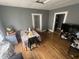 Cozy living room featuring hardwood floors, neutral wall colors, and natural light at 2511 Chapel Hill Rd, Durham, NC 27707