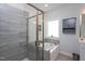 Modern bathroom showcasing a soaking tub, tiled shower, and stylish fixtures for a spa-like feel at 2521 Heathland Farm Dr, Fuquay Varina, NC 27526