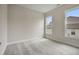 Cozy bedroom with neutral walls, plush carpeting, and lots of natural light at 2537 Cedar Hedge Ct, Apex, NC 27523