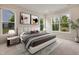 Comfortable bedroom featuring large windows and neutral decor at 2537 Cedar Hedge Ct, Apex, NC 27523