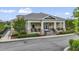 Inviting community clubhouse with rocking chairs on the porch, enhancing the neighborhood's appeal at 2537 Cedar Hedge Ct, Apex, NC 27523