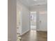 Foyer view showcasing hardwood floors, an open floor plan, and natural light at 2537 Cedar Hedge Ct, Apex, NC 27523