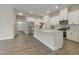 Beautiful kitchen with stainless appliances, a center island, and sleek cabinets at 2537 Cedar Hedge Ct, Apex, NC 27523