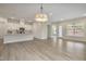 Bright, open kitchen with a center island and hardwood floors at 2537 Cedar Hedge Ct, Apex, NC 27523