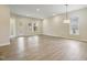 Spacious open floor plan with wood floors and natural light at 2537 Cedar Hedge Ct, Apex, NC 27523