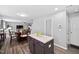 Bright eat-in kitchen leading to a living area perfect for open-concept living at 2604 Fortrose Ln, Fuquay Varina, NC 27526
