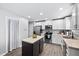 Well-equipped kitchen featuring stainless steel appliances and a convenient center island at 2604 Fortrose Ln, Fuquay Varina, NC 27526