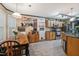 Bright kitchen with a dining area and wooden cabinets at 275 Eagle Stone Rdg, Youngsville, NC 27596