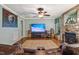 Bright living room with a stone fireplace and entertainment center at 275 Eagle Stone Rdg, Youngsville, NC 27596