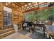 Outdoor kitchen with a grill, griddle, and a counter for prepping meals in the backyard at 275 Eagle Stone Rdg, Youngsville, NC 27596