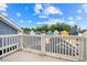 Balcony overlooking the neighborhood showing rooftops and beautiful blue sky at 290 Quarter Gate Trce, Chapel Hill, NC 27516