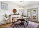 Charming dining room with rustic table and decorative details at 290 Quarter Gate Trce, Chapel Hill, NC 27516