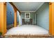 Inviting front porch features rocking chairs, neutral decor, and views of front yard at 290 Quarter Gate Trce, Chapel Hill, NC 27516
