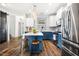 Modern kitchen featuring stainless steel appliances and white and blue cabinets at 290 Quarter Gate Trce, Chapel Hill, NC 27516