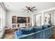 Spacious living room with media center, large windows and ample natural light at 290 Quarter Gate Trce, Chapel Hill, NC 27516