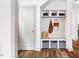 Mudroom featuring storage cubbies, bench, and coat hooks at 290 Quarter Gate Trce, Chapel Hill, NC 27516